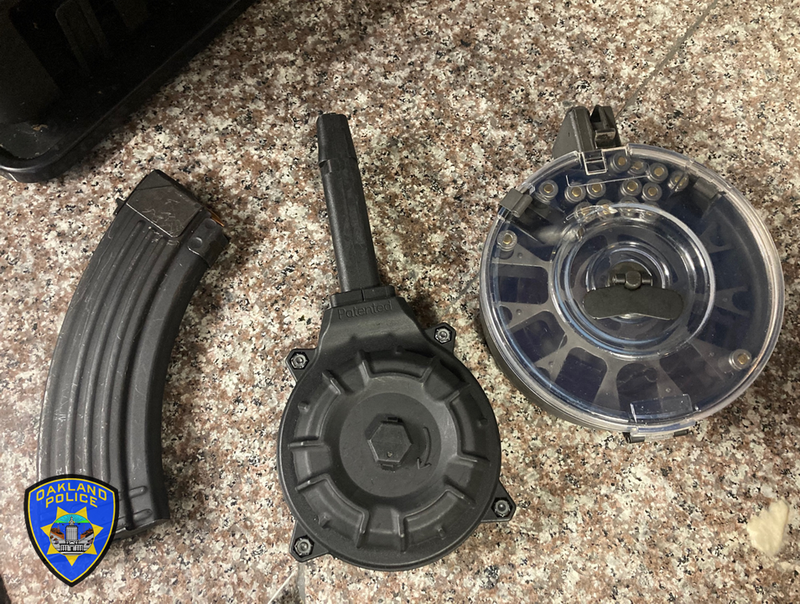 Officers recovered five firearms with high-capacity magazines during the investigation on Wednesday.