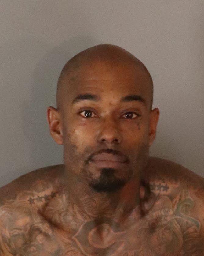 Booking photo of murder suspect Celestine Stoot