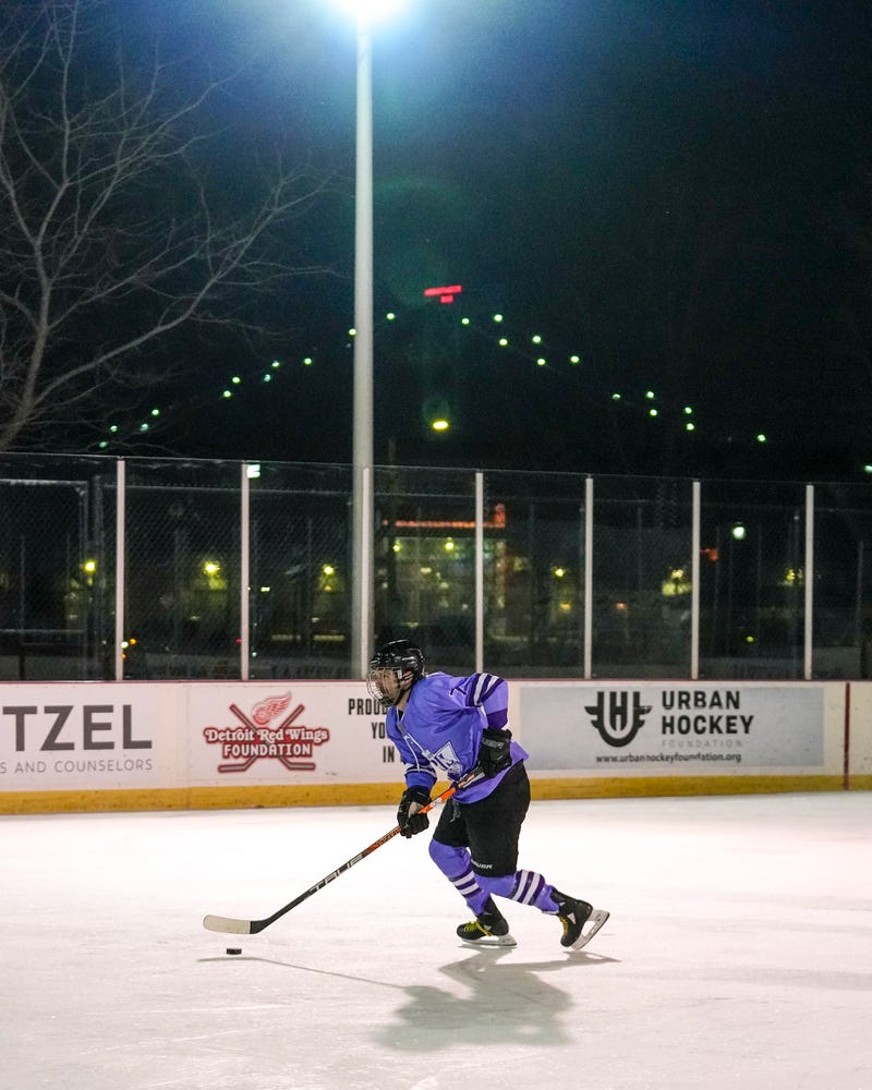 Ambassador Bridge in the background at Clark Park ice rink