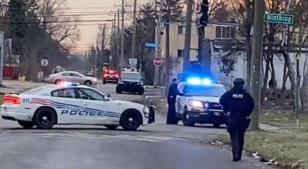 Detroit police on the scene of a barricaded gunman situation at I-96 and Greenfield, 3-block perimeter in place