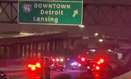 Heavy police presence blocking the freeway as officers gather evidence near the northbound M-39 ramp to I-96