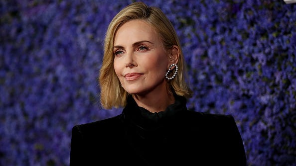 Charlize Theron Wants to Get Her 'A–– Kicked' in WWE Ring