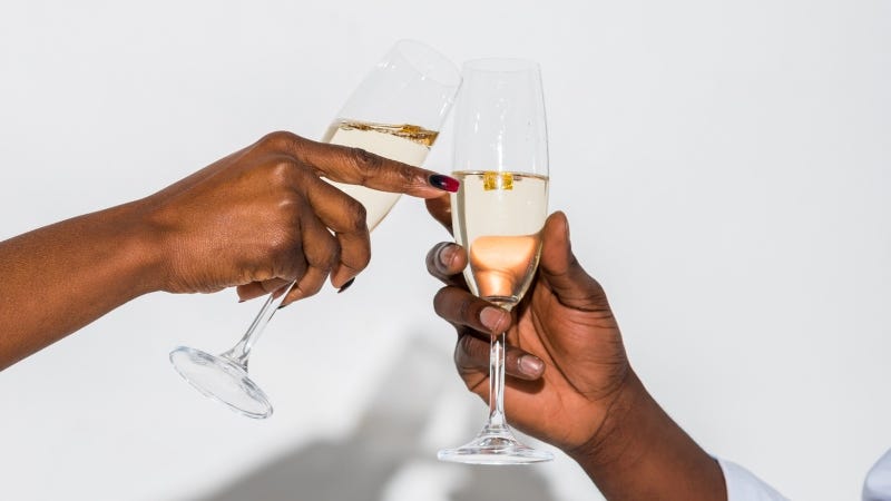 Champagne glass cheers Getty Images