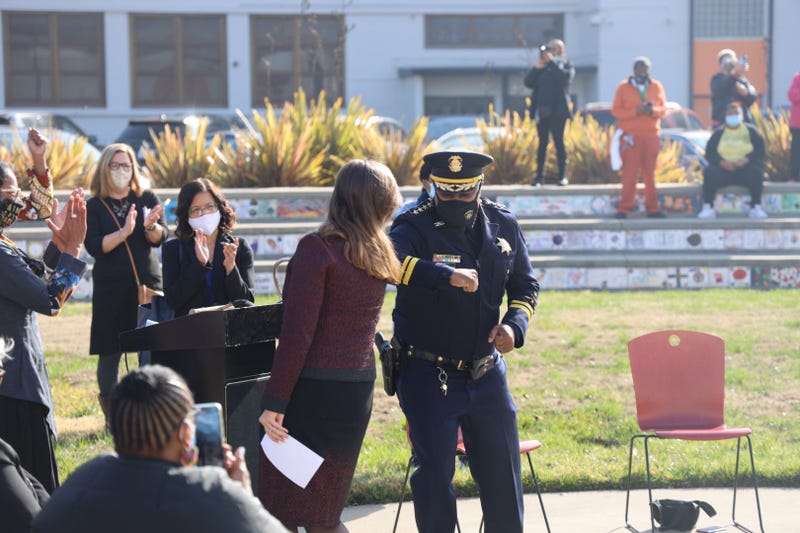 New Chief LeRonne Armstrong and Mayor Libby Schaaf bump elbows after his swearing in Monday morning.
