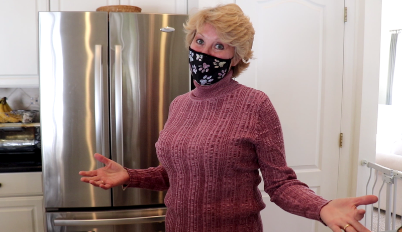 Chris's smile is “masked” but you can see the joy in her eyes from preparing lasagna for a neighbor