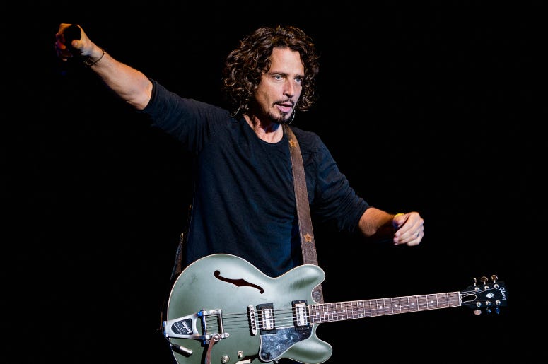 Chris Cornell of Soundgarden performs on stage during the 2014 Lollapalooza Brazil. 