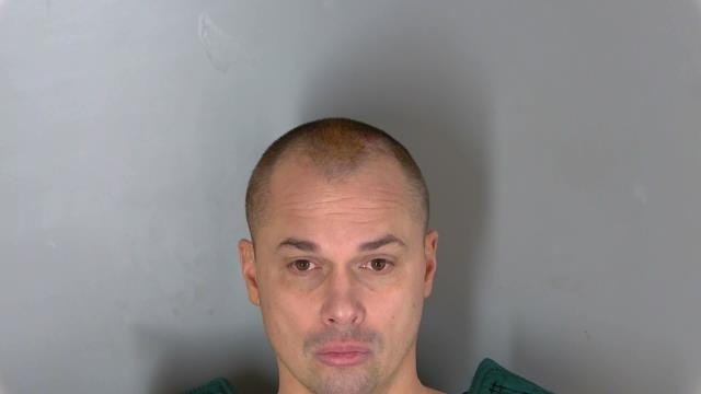 Booking photo of 43-year-old Christopher Lynch