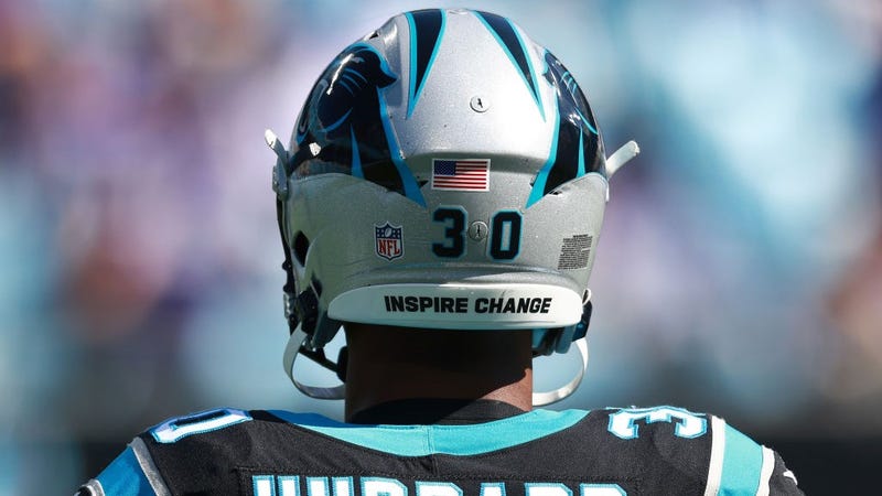 A detailed view of the helmet of Chuba Hubbard #30 of the Carolina Panthers that reads, "Inspire Change" during warm ups prior to the game against the Minnesota Vikings at Bank of America Stadium on October 17, 2021 in Charlotte, North Carolina.
