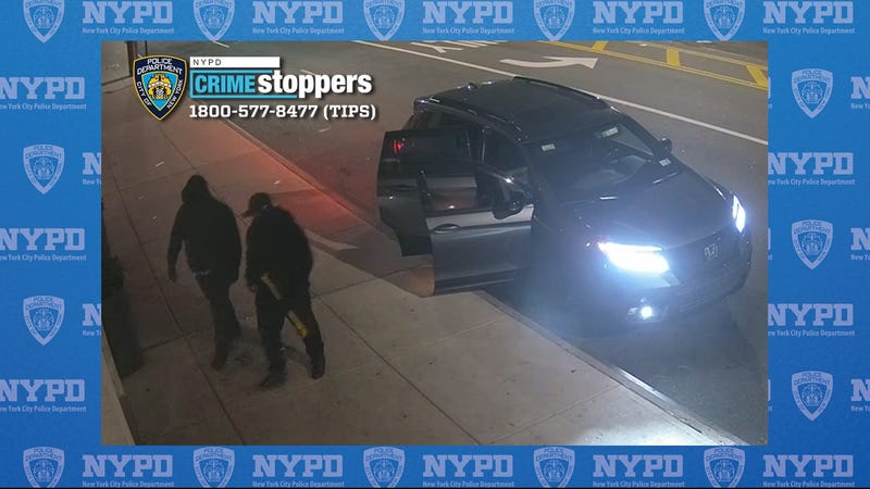 Surveillance images show two of the suspects with burglary tools near a Honda getaway vehicle