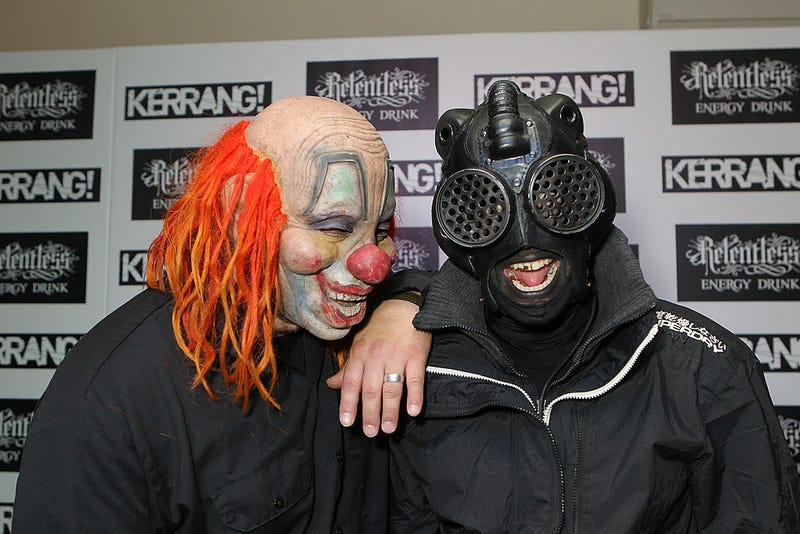 Clown and Sid of Slipknot pose in the winners room at The Kerrang! Awards at the Troxy on June 13, 2013 in London, England