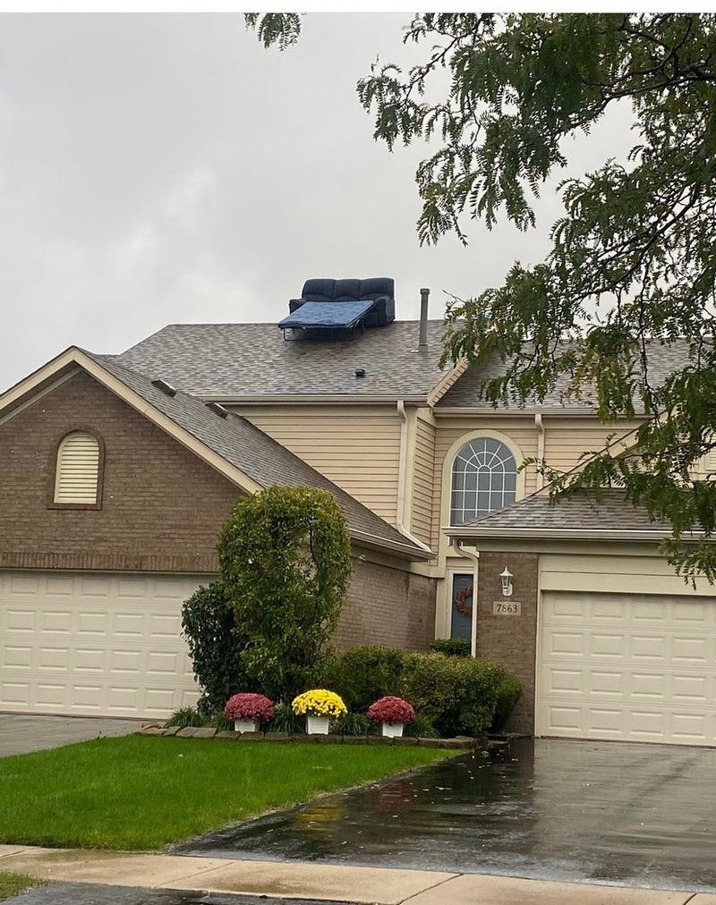 Tinley Park man unamused by couch someone put on his home’s roof