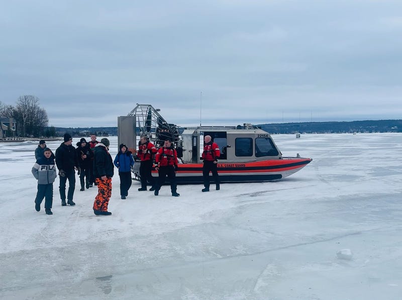 Coast Guard rescuing people stuck on Lake Michigan