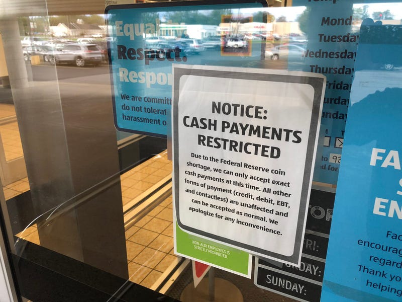 A sign warning customers about the coin shortage