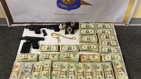 Cash, coke, guns seized in bust of Macomb County drug trafficking organization: MSP