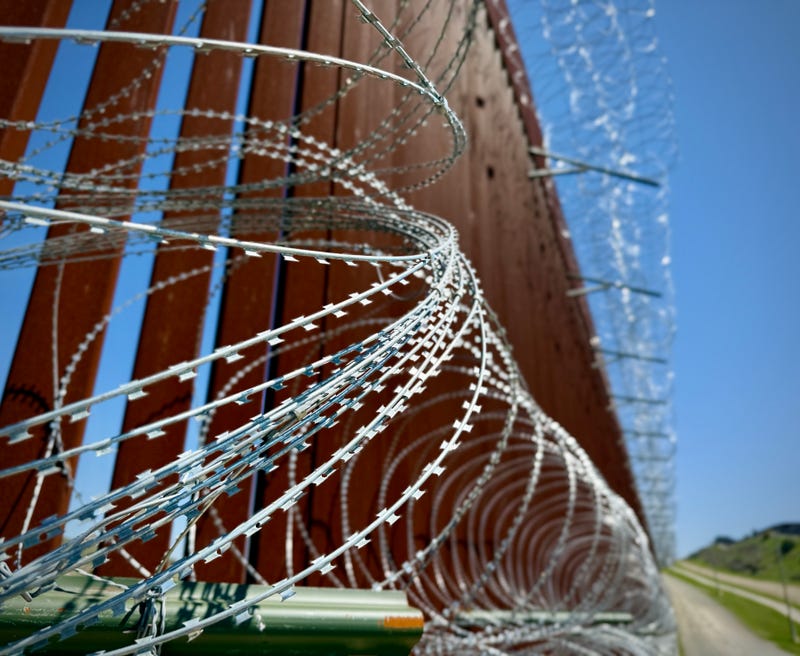 Concertina wire installed on the border fence near San Diego