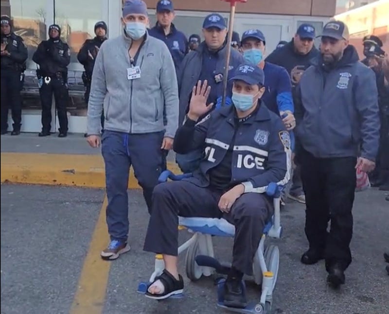 Officer Orlando Adorno, who was shot in the foot by Raheen Joye, of the Bronx, leaving the hospital on Dec. 21, 2022 to a crowd and applause.