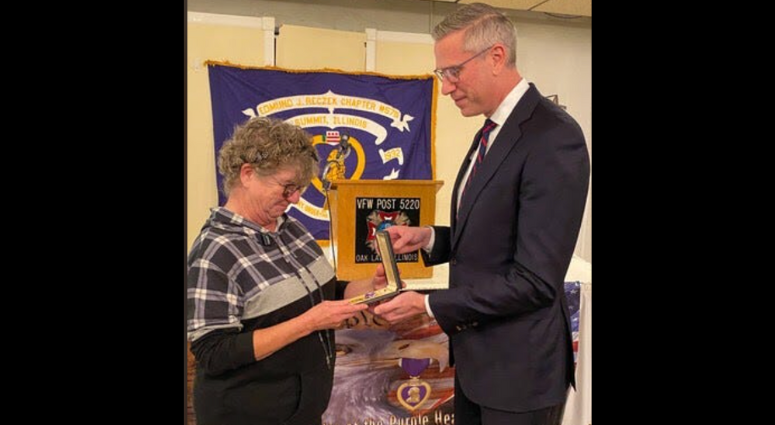 Illinois State Treasurer Michael Frerichs reunited Army Rifleman James R. Bennett's Purple Heart with his niece, Patti Knies, during a ceremony at VFW Post 5220 in Oak Lawn on Nov. 10, 2025.