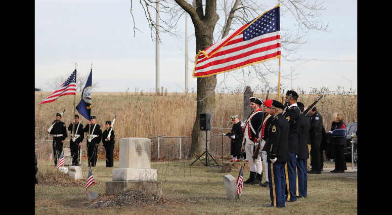 Army Reserve Soldiers lay wreaths for veterans dating back to the Revolutionary War