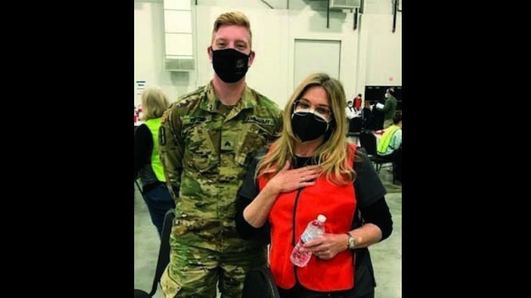Michigan National Guard medic saves nurse at vaccine clinic
