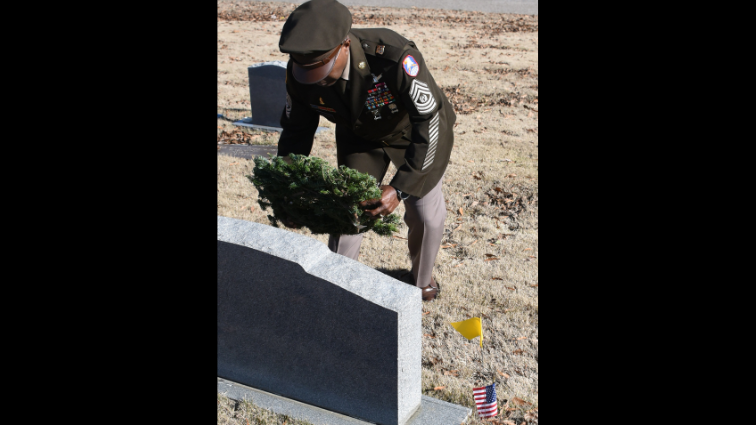Hometown hero honors veterans during Wreaths Across America