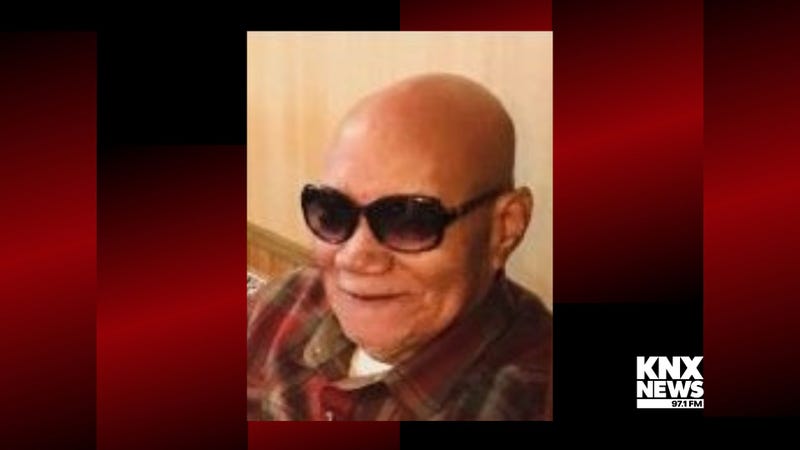elderly bald white man wearing sunglasses