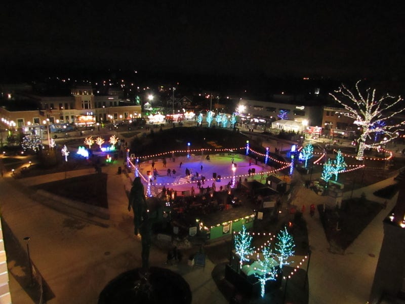 Downtown Royal Oak is glowing with holiday lights and a small ice skating rink