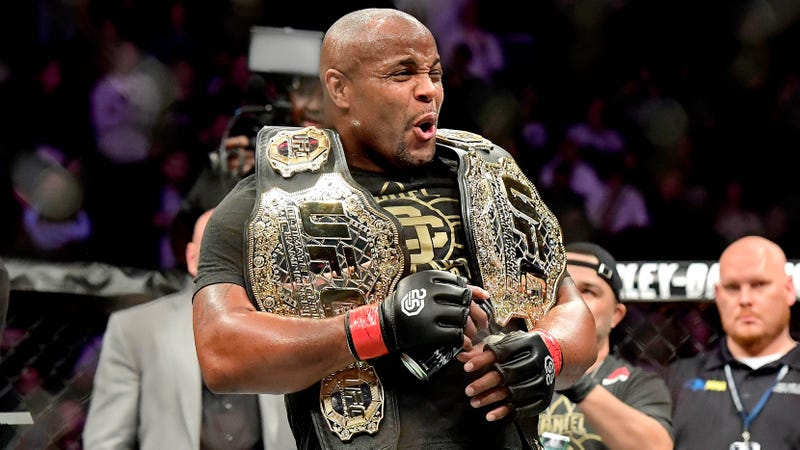 Daniel Cormier celebrates his heavyweight championship victory over Derrick Lewis at UFC 230.