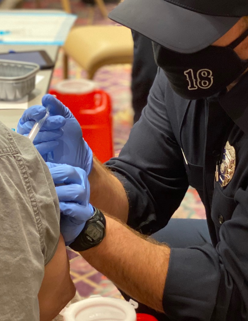 A person receives their coronavirus vaccination