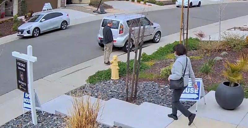 Couple leaving open house