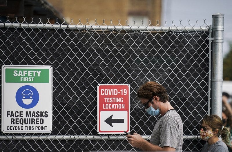 COVID testing/AP Photo