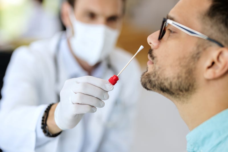 A man takes a test for Covid-19
