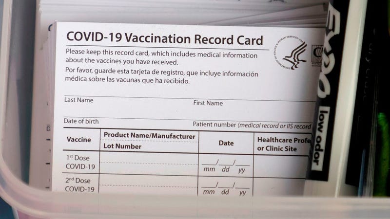 Blank COVID-19 vaccination cards are stacked at a pop-up COVID-19 vaccination clinic at Larry Flynt's Hustler Club on December 21, 2021 in Las Vegas, Nevada.