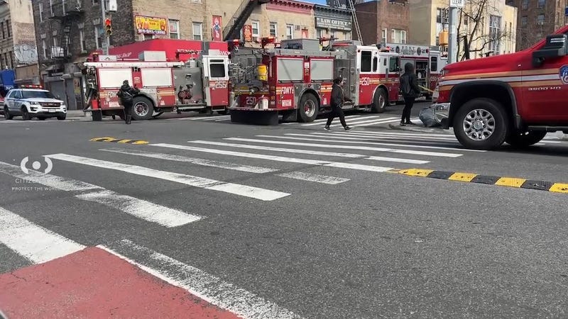 Two men, ages 43 and 35, were injured when the crane struck their vehicle.