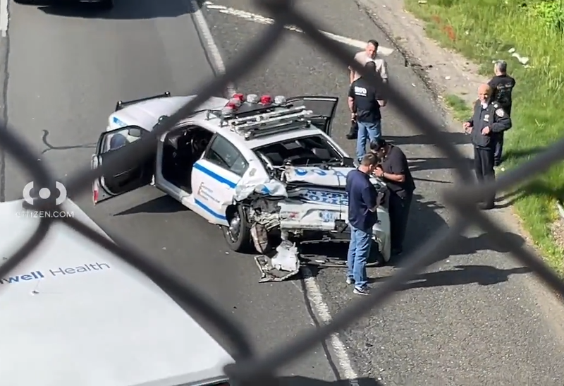 Police investigate at the crash scene on Thursday morning