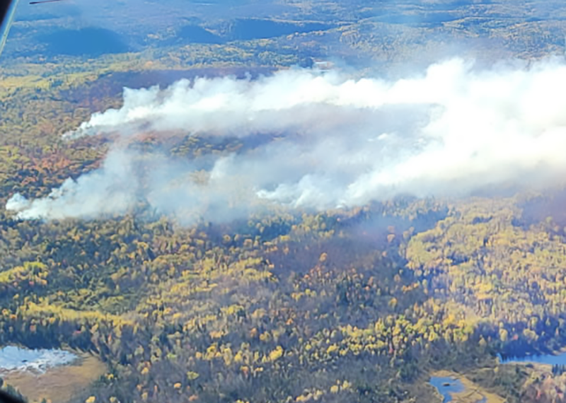 Aerial view of the Crosby fire captured on October 8, 2025.