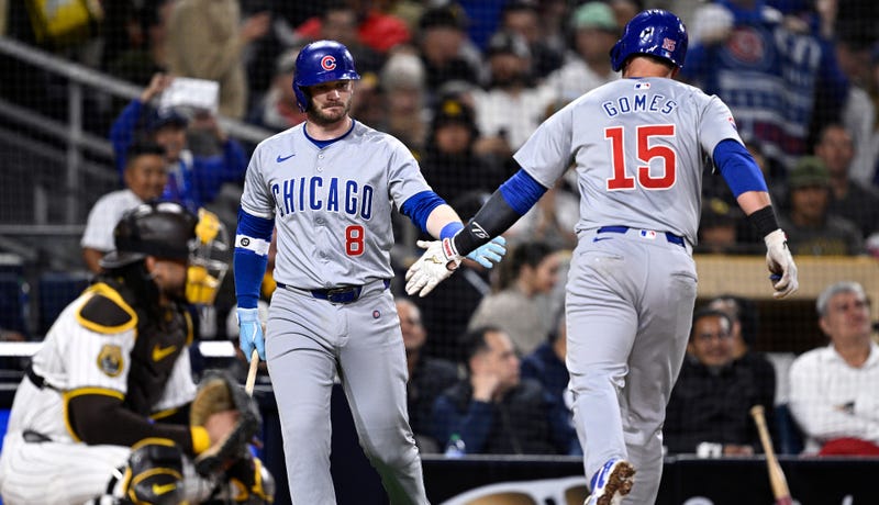 Cubs outfielder Ian Happ, and catcher Yan Gomes
