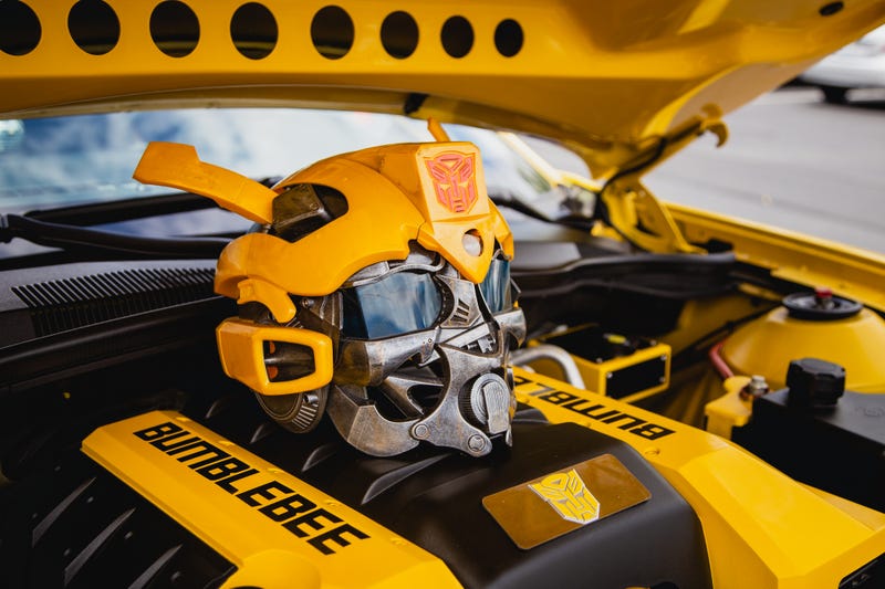 Customized yellow Bumblebee Camaro outside CybFest NW