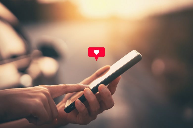 Woman using a dating app on a smart phone
