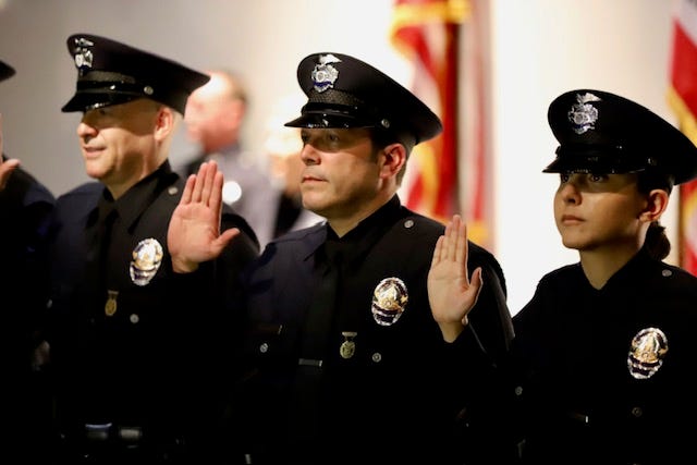 Josh Rubenstein sworn in as a police officer.
