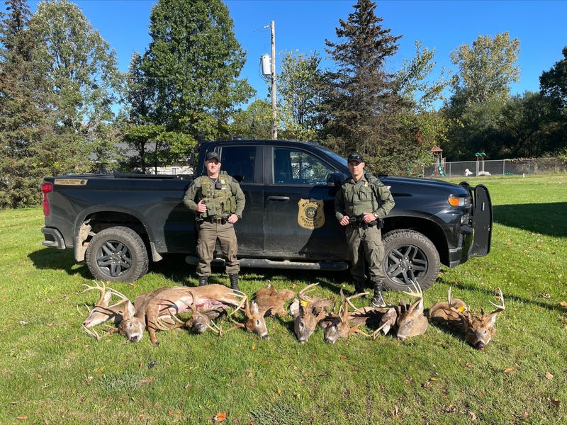 Conservation Officers with poached trophy bucks