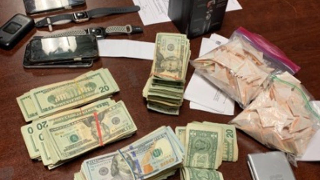Detroit Special Operations teams arrest 14, seize tens of thousands of dollars in cash, drugs and firearms