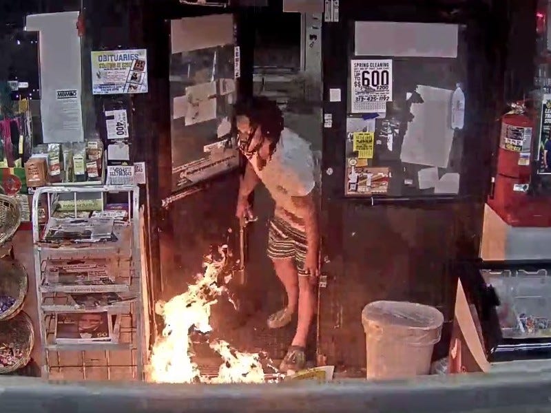 Suspect sets fire inside Detroit gas station