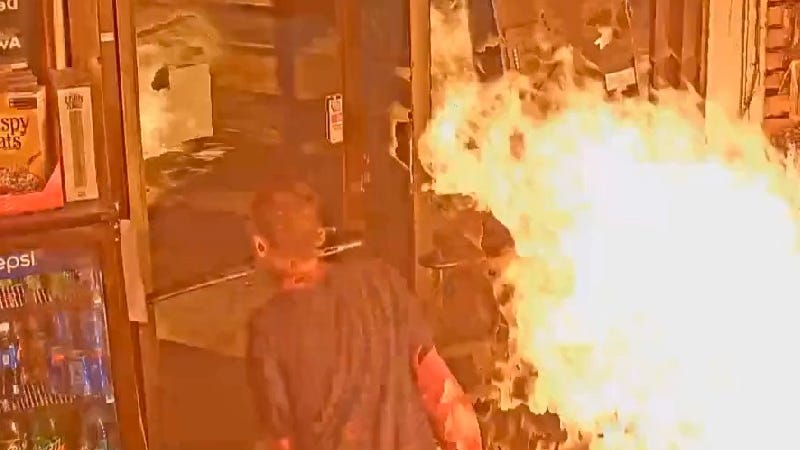 Suspect arrested after wild video shows him dumping bucket of gas inside Detroit business, lighting it on fire