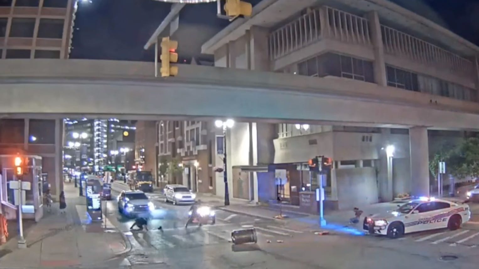 WATCH: Driver of 3-wheeled vehicle fleeing traffic stop runs over Detroit police officers, injures 1 person