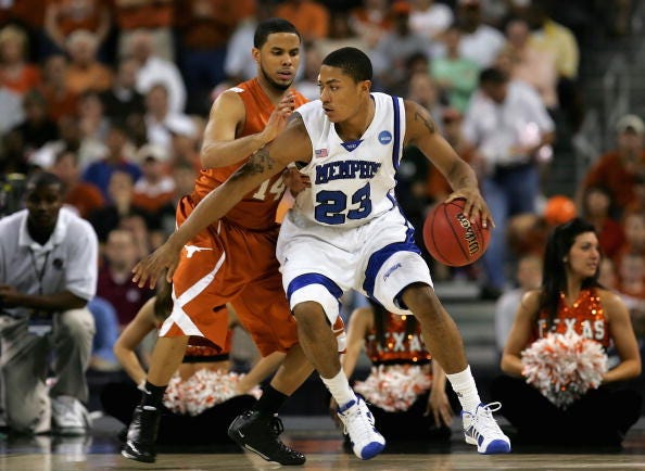 Derrick Rose backs down on DJ Augustine of Texas while playing for Memphis.