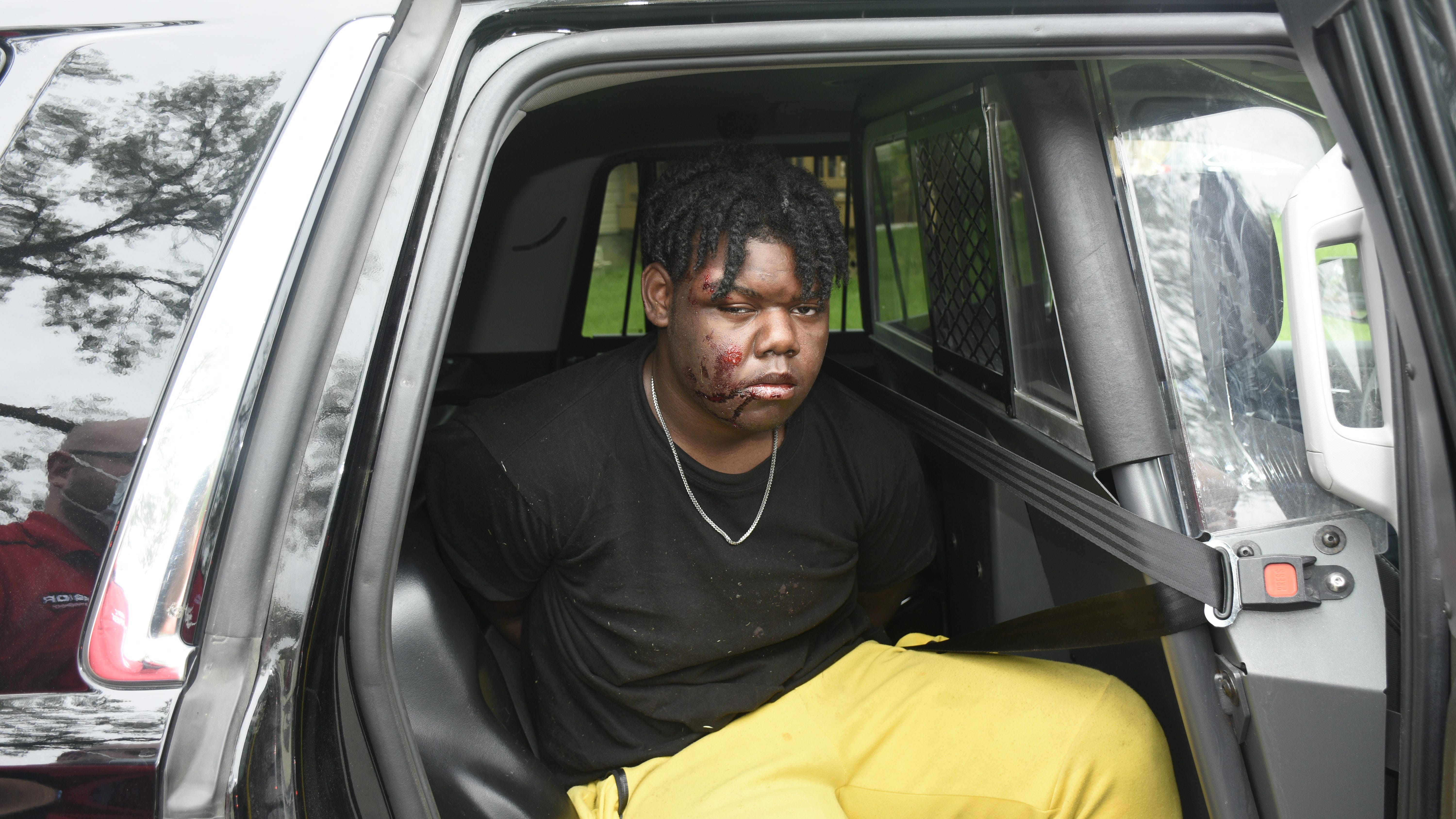 Family sues Warren police, teen says he's 'scared to go places' after being punched, kicked by officers