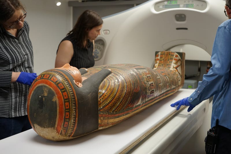 Field Museum researchers examine a mummy using a CT scan