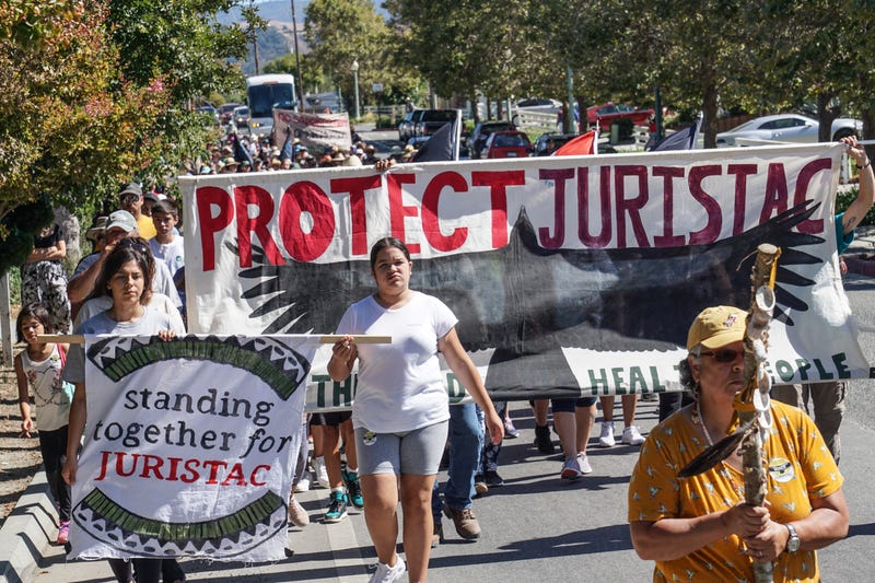 Protestors gather calling for the protection of Juristac, the land which is threatened by a development project.