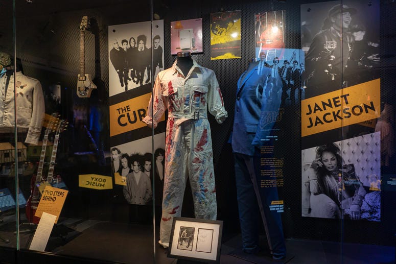Select items from new Inductees The Cure on display.
