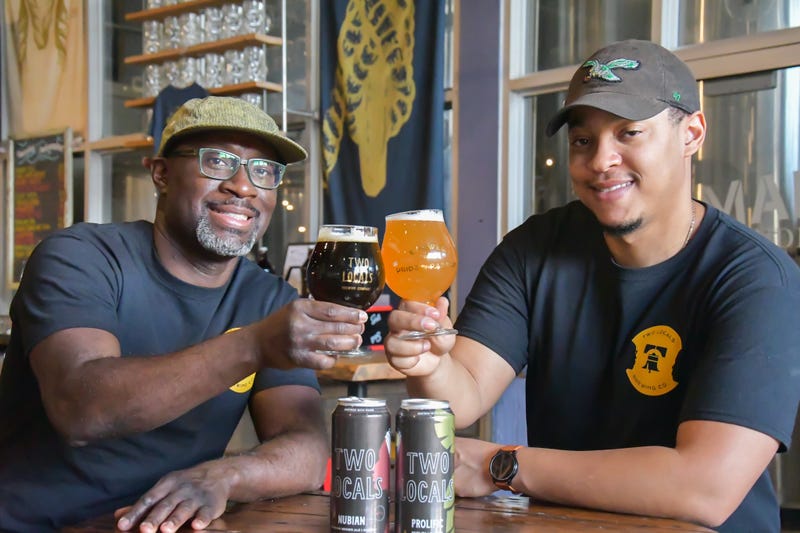 Richard and Mengistu Koilor, the pair behind Two Locals Brewing, celebrate the release of their first canned beers.